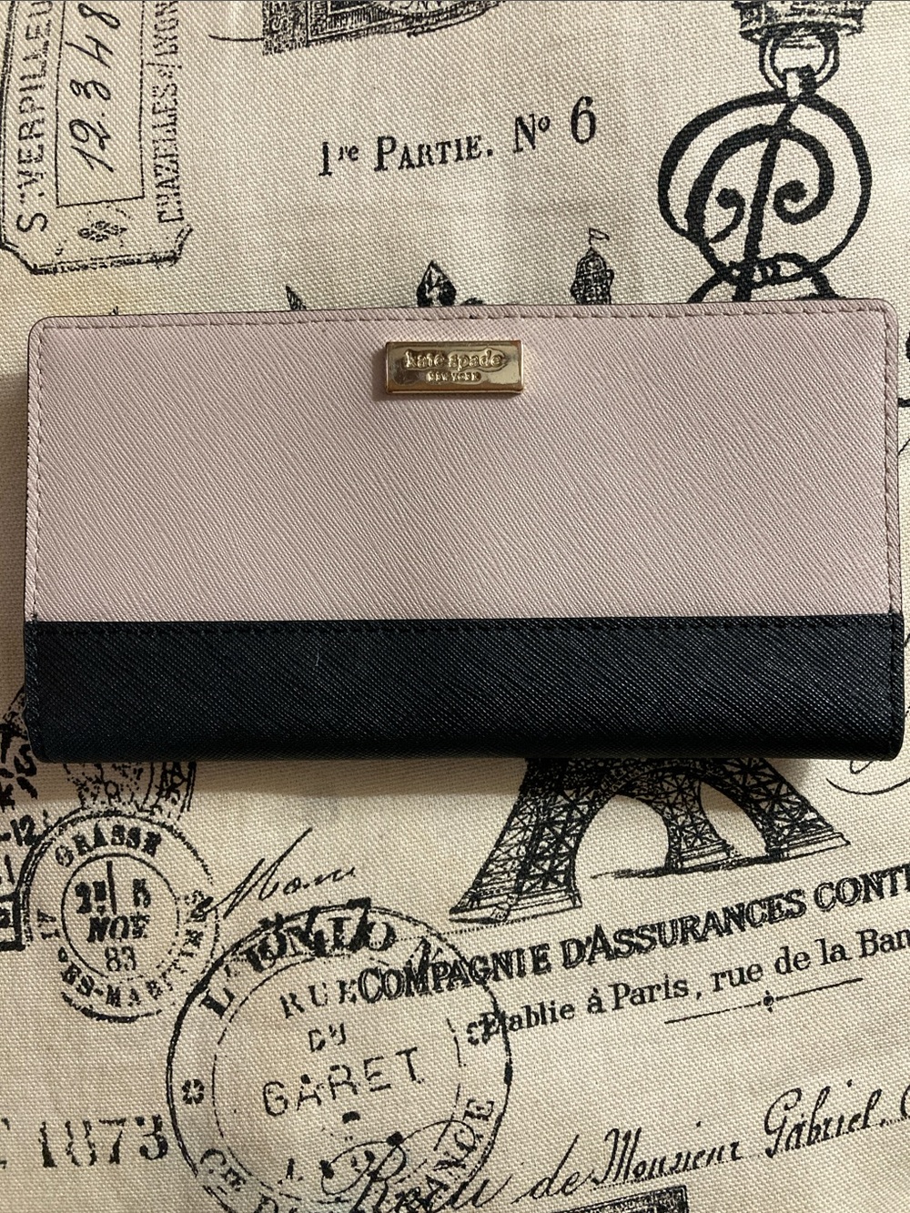 kate spade New York Laurel Way Stacy Slim Bifold Wallet in Almond/Black Leather